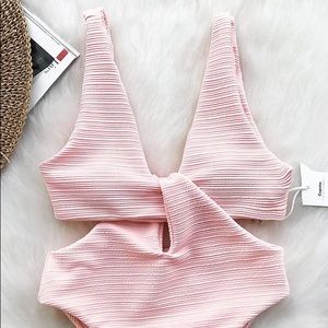 Pink knotted onepiece bathing suit